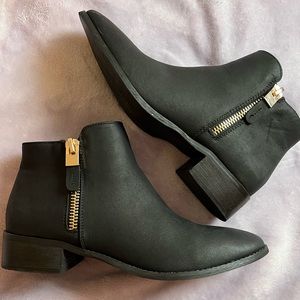 Chelsee Black booties with gold zippers